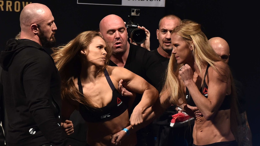 Ronda Rousey and Holly Holt scuffle at weigh-in