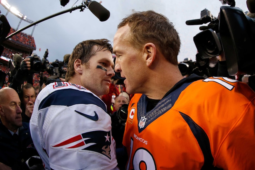Peyton Manning and Tom Brady hug after their AFC Championship game