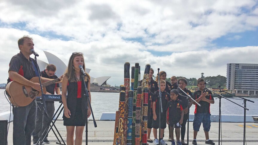 The Mount Druitt Indigenous Choir perform at the Australia Day launch in Circular Quay.