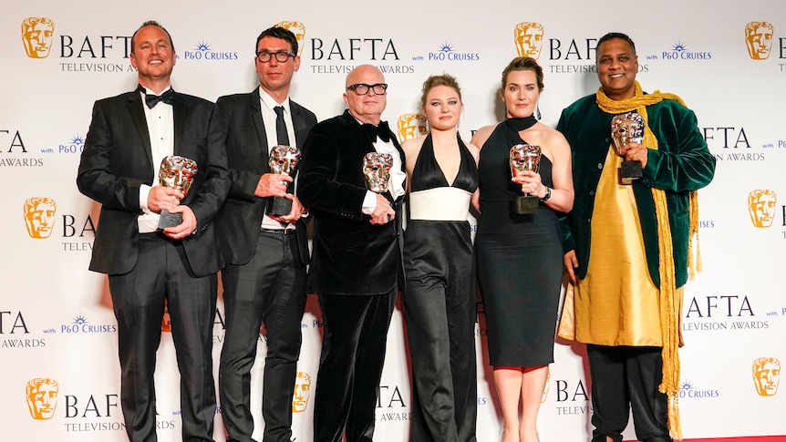 The cast of I Am Ruth pose with BAFTA awards.