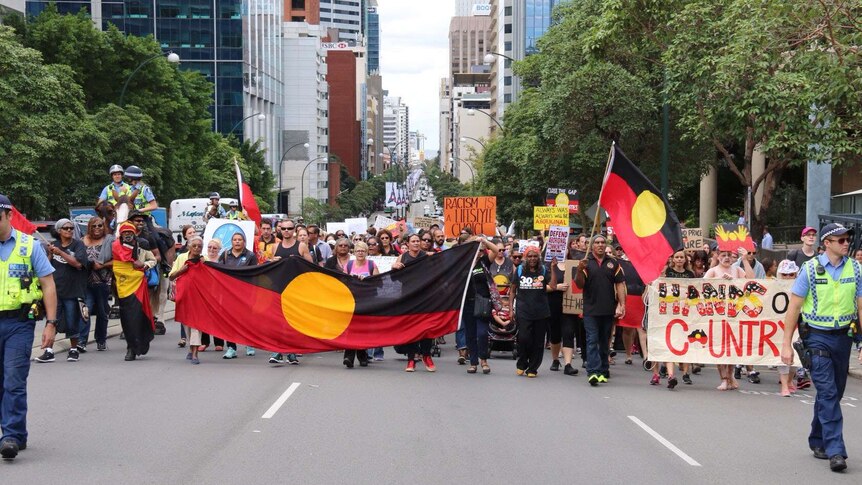 Protesters marching in Perth against closure of remote Aboriginal communities