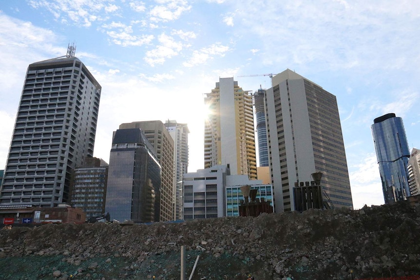 Sun shines through buildings looking up at construction site at Queen's Wharf in Brisbane's CBD, on June 14, 2018.