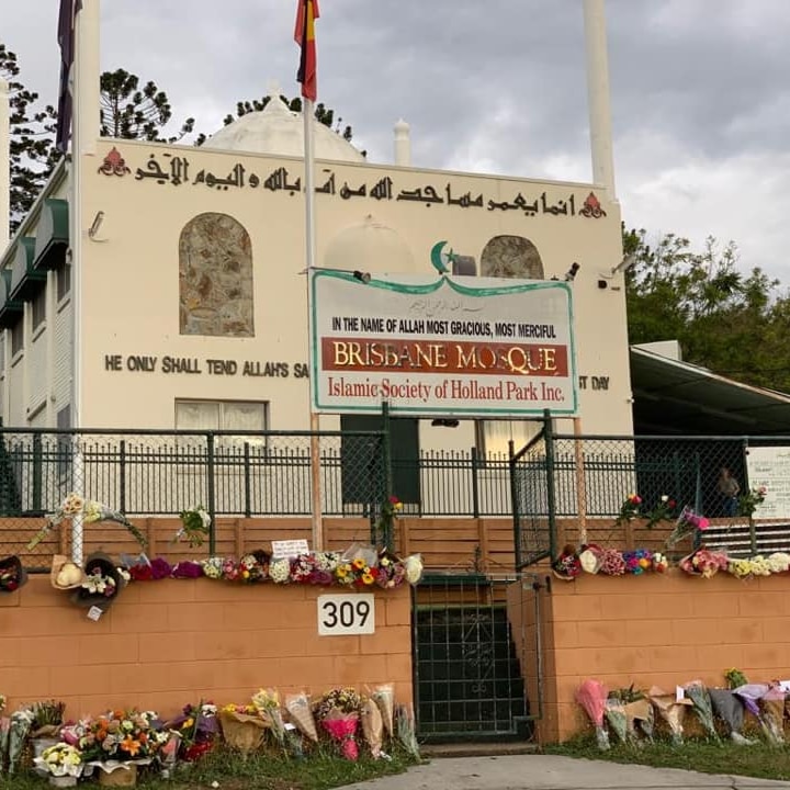 Outside the Holland Park mosque, dozens of flowers shown laid on the outside walls. 