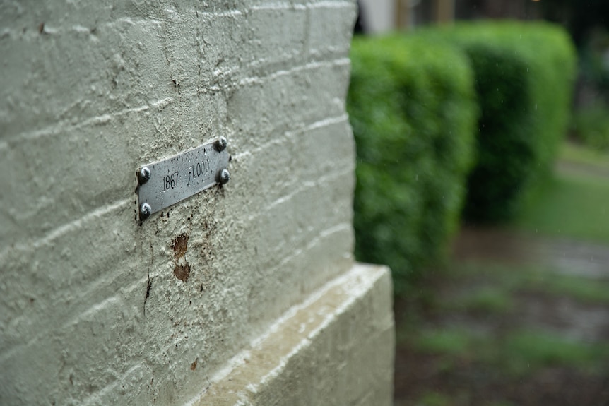 A plaque on a wall.