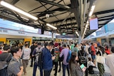 People stuck waiting for a train