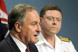 Home Affairs Minister Bob Debus speaks during a press conference in Canberra