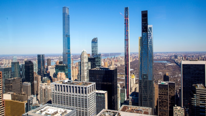 A city scape of new york with the skinny steinway tower in the centre