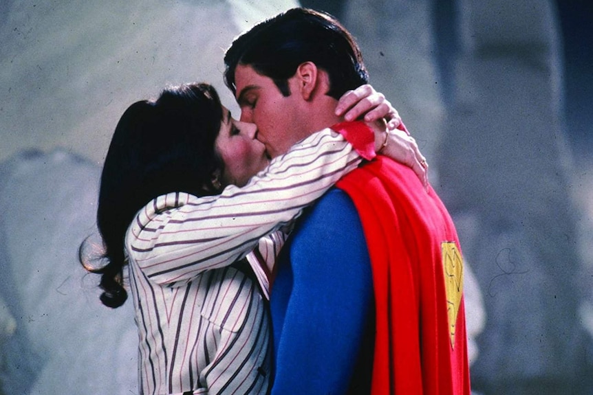 Margot Kidder and Christopher Reeve kiss in Superman II.