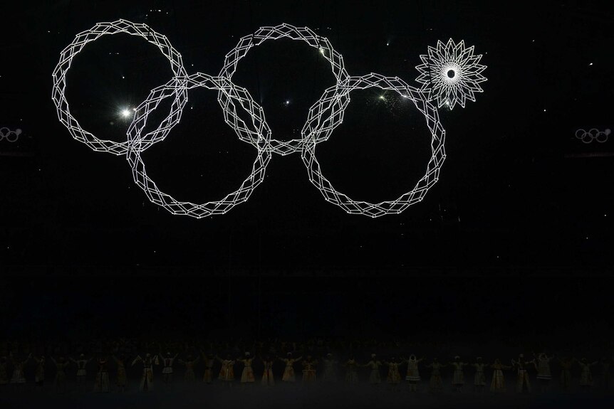 Snowflakes turn into four Olympic rings but one fails to form at Sochi 2014 Opening Ceremony.