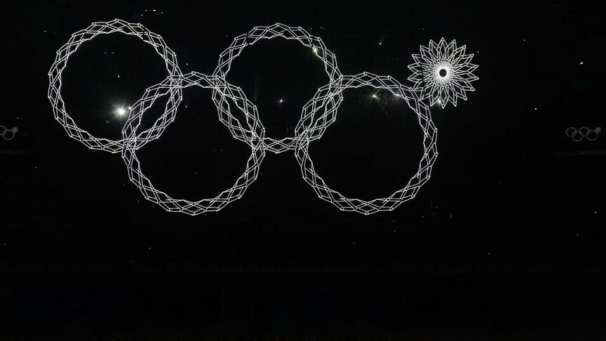 Snowflakes turn into four Olympic rings but one fails to form at Sochi 2014 Opening Ceremony.