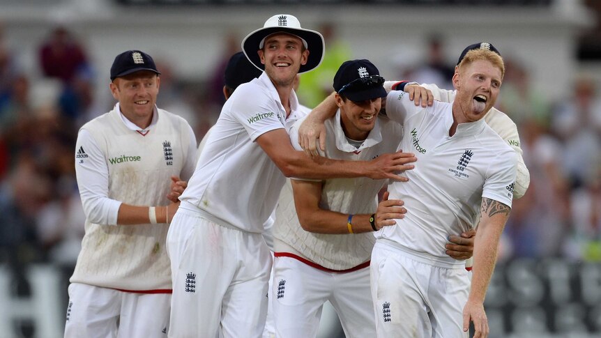 On a high ... England celebrates the dismissal of Mitchell Johnson on day two at Trent Bridge