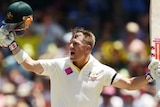 David Warner celebrates his hundred at the SCG