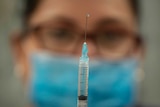 Experts say any prediction on a vaccine timeframe is still an 'educated gamble'.