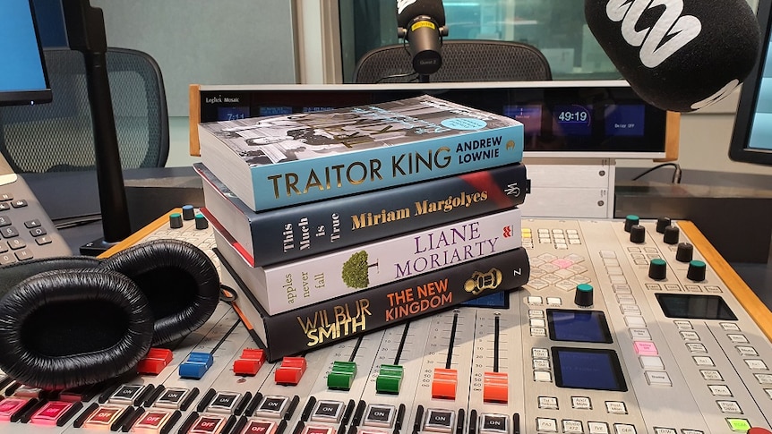 a picture of four books on a radio desk
