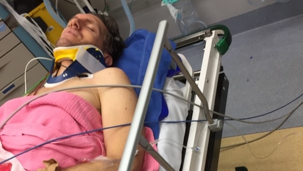 Adrian Lynch lies in hospital after his accident