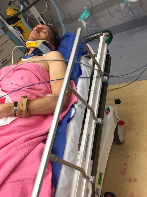 Adrian Lynch lies in hospital after his accident