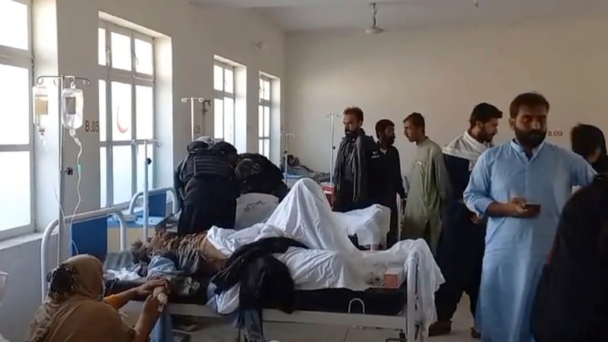 Injured victims of bomb explosion are treated at a hospital.