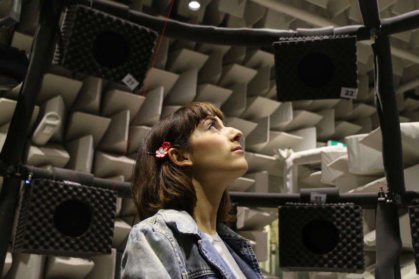 DJ and musician Elizabeth Rose sits inside the anechoic chamber at Macquarie University