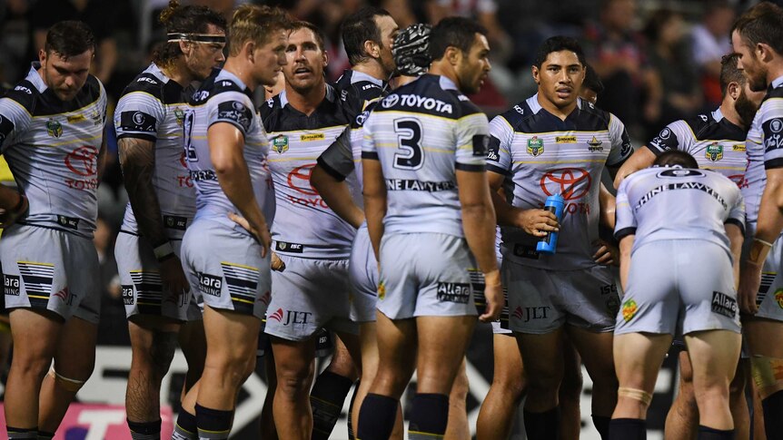 North Queensland Cowboys survey the damage against the Dragons