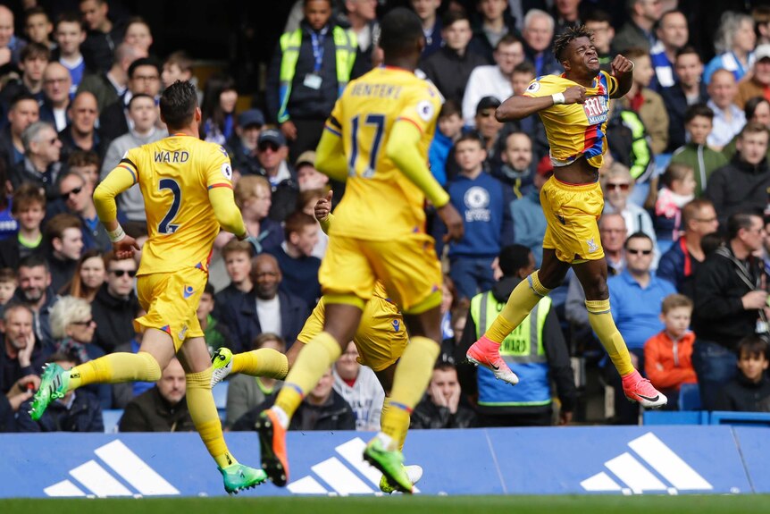 Wilfried Zaha celebrates a Crystal Palace goal
