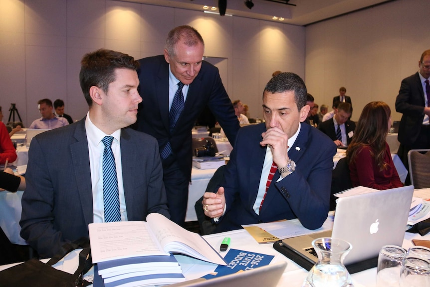 Nick Harmsen with South Australian Premier Jay Weatherill and Treasurer Tom Koutsantonis on budget day.