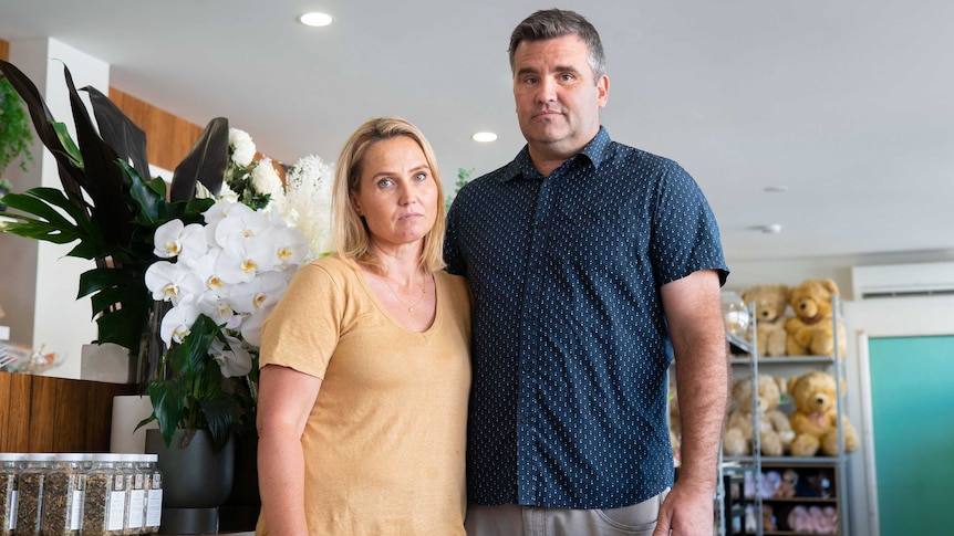 A couple inside a flower shop