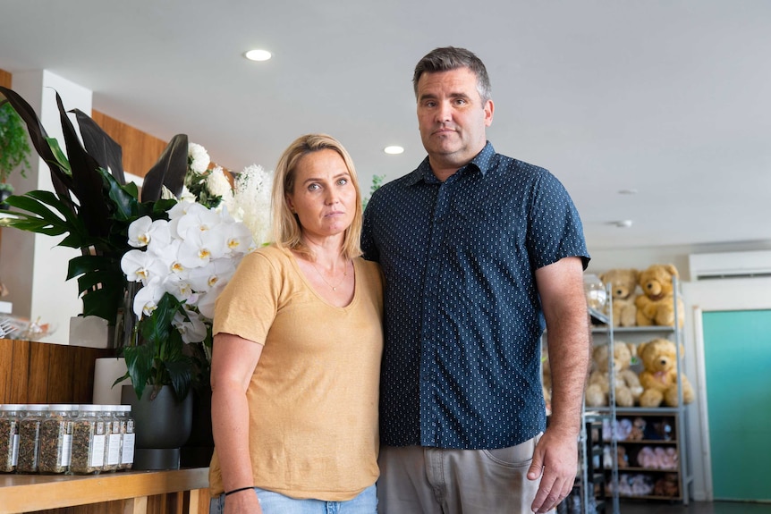 A couple inside a flower shop