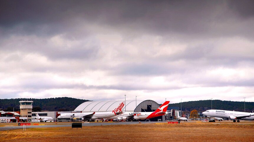 Planes on a runway.