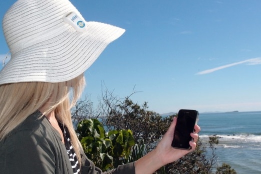 The smartphone is held in the sun to detect how much sun exposure is recieved.