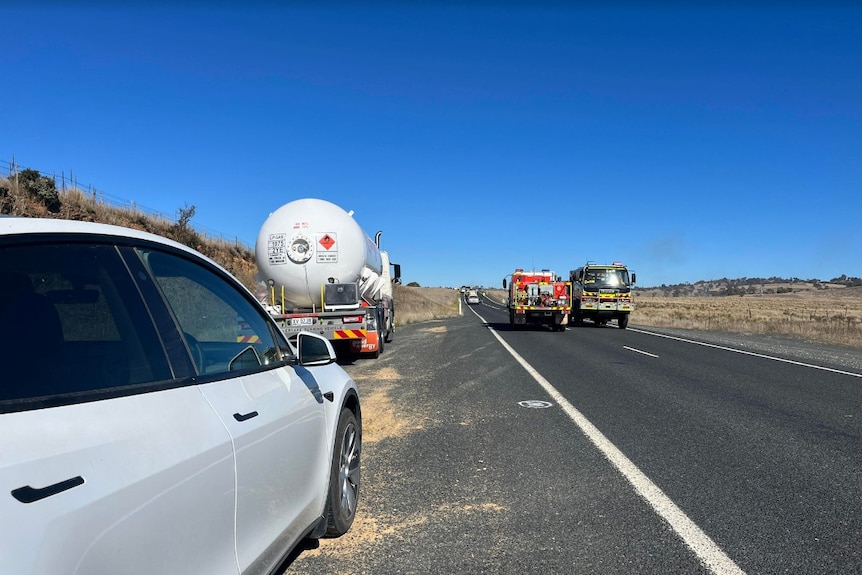 emergency services on a road that is blocked.