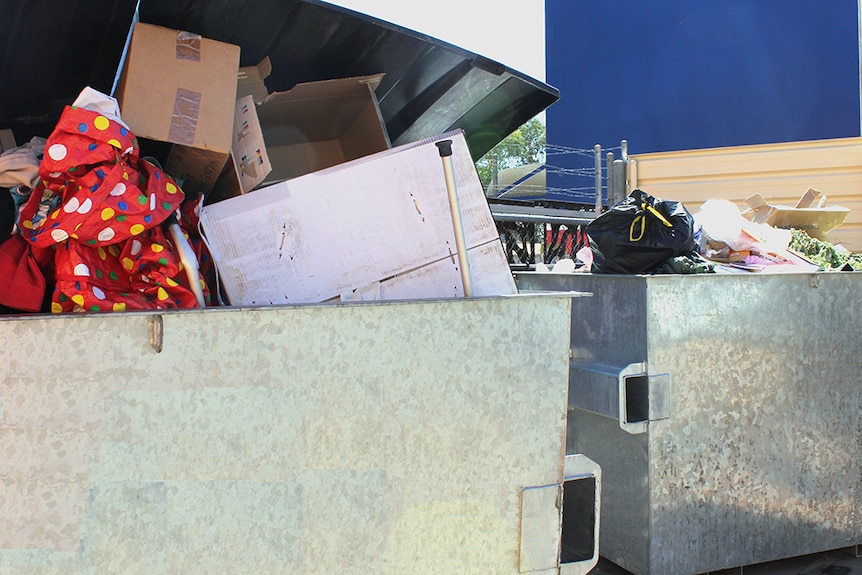 Two skip bins are emptied at least three times a week with 'rubbish' donations.