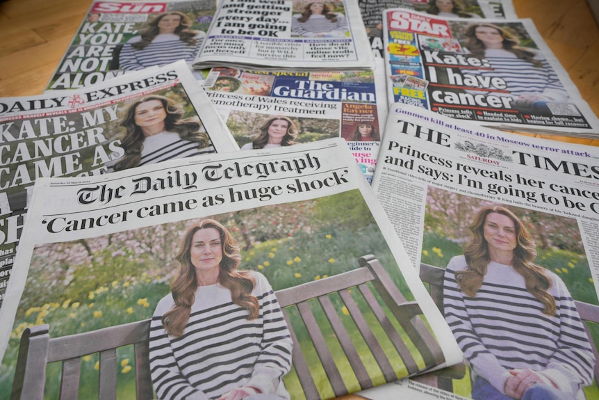 Newspapers laid out showing Princess Catherine on the front page.