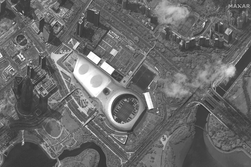 This satellite image appears to show Chinese security force vehicles inside the Shenzen Bay Sports Centre.