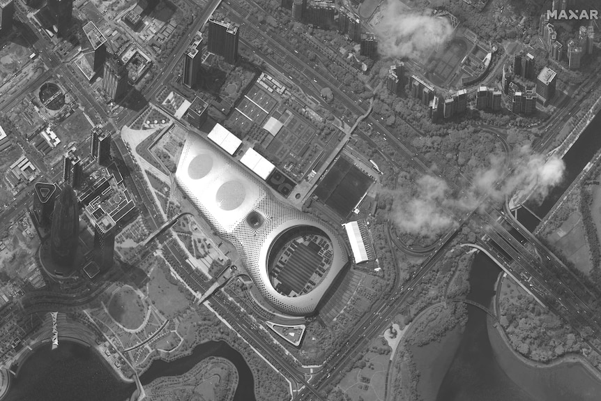 This satellite image appears to show Chinese security force vehicles inside the Shenzen Bay Sports Centre.