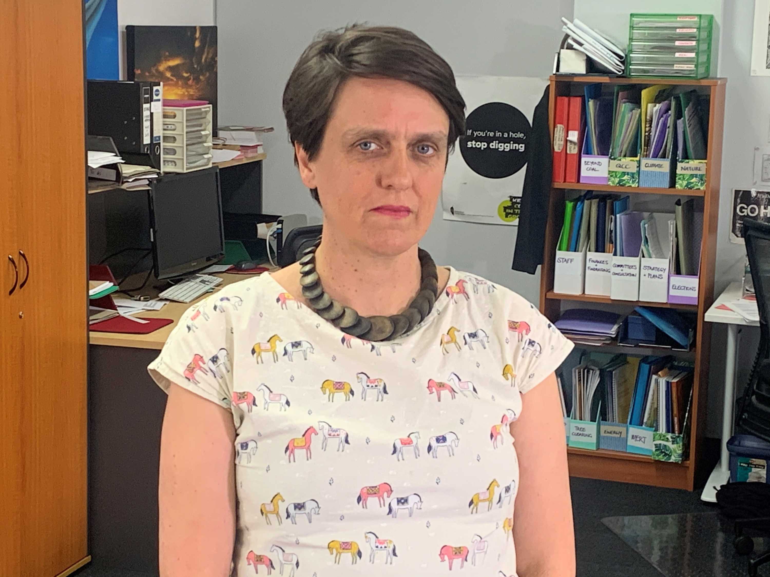 Ellen Roberts sits in her office and looks directly at the camera.