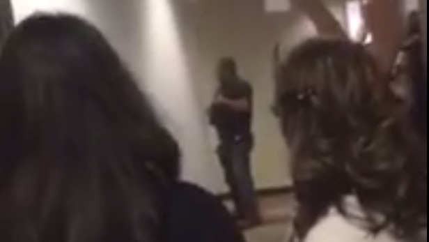 An officer captured in footage taken inside the Inland Regional Centre