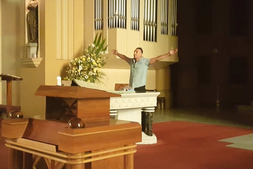 James Gargasoulas at the pulpit in Melbourne's St Francis Church