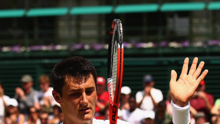 Winner: Bernard Tomic celebrates match point