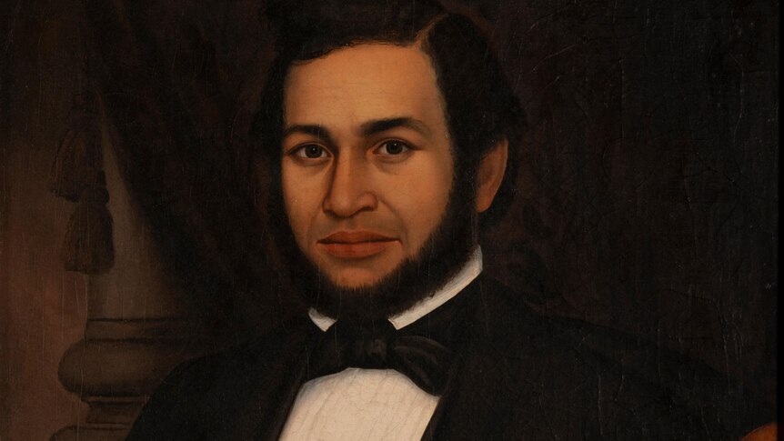 An 18th century painting of an African American man in a suit