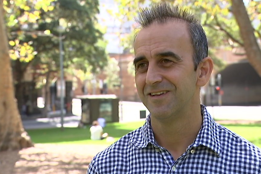An image from a TV interview with Paul Antonich, the identical twin of 1988 Stawell Gift winner Scott Antonich.
