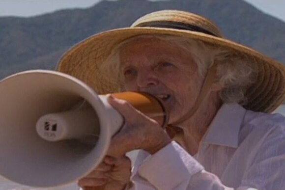Margaret Thorsborne speaking into a megaphone