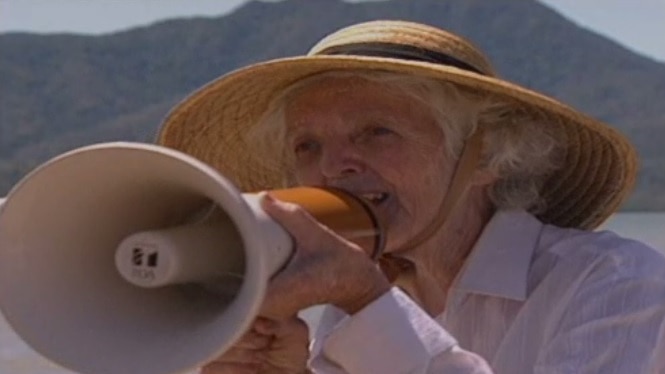 Margaret Thorsborne speaking into a megaphone