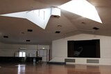 An empty hall space with skylight