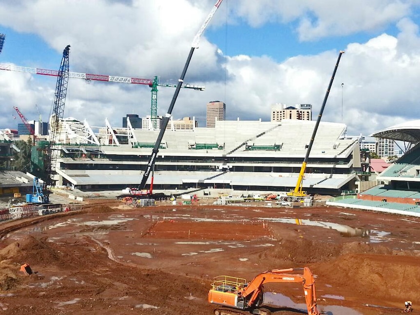 Plenty of mud as work continues to redevelop Adelaide Oval for AFL and Test cricket.