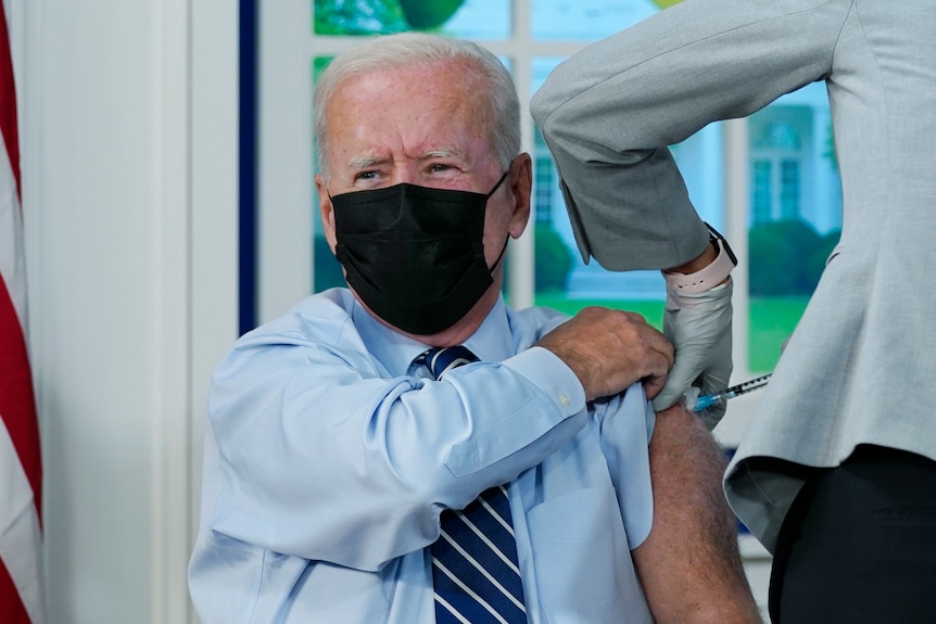 US President Joe Biden receives a vaccine shot