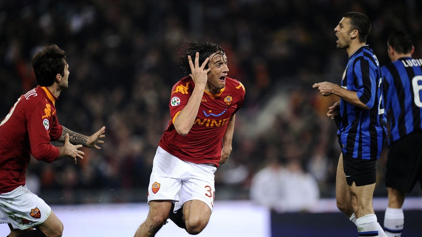 Luca Toni gives Roma an invaluable win.