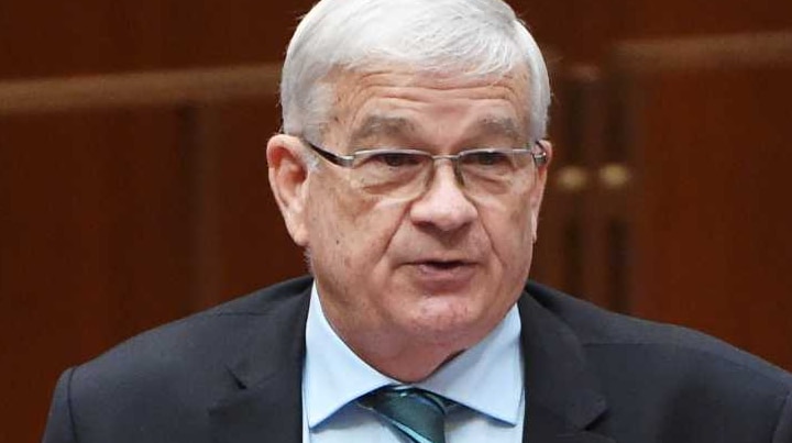 One Nation Senator Brian Burston makes his maiden speech in the Senate, Pauline Hanson sits in front.