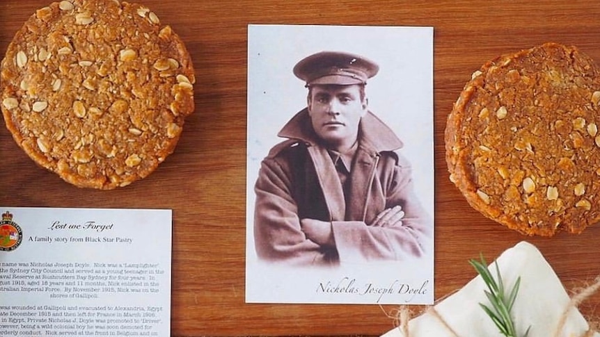 These Anzac biscuits from a Sydney bakery with a picture of a WWI soldier and a sprig of rosemary