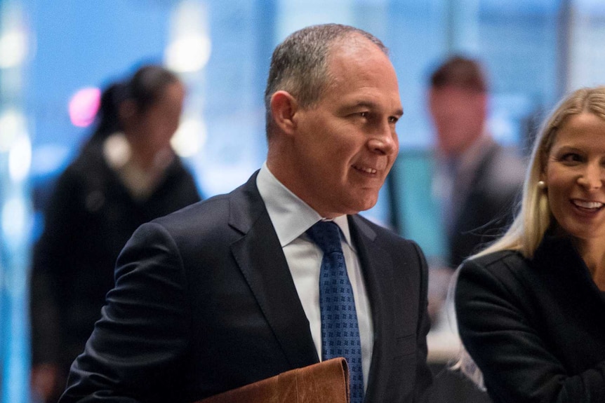 Oklahoma attorney-general Scott Pruitt walks into Trump Tower.