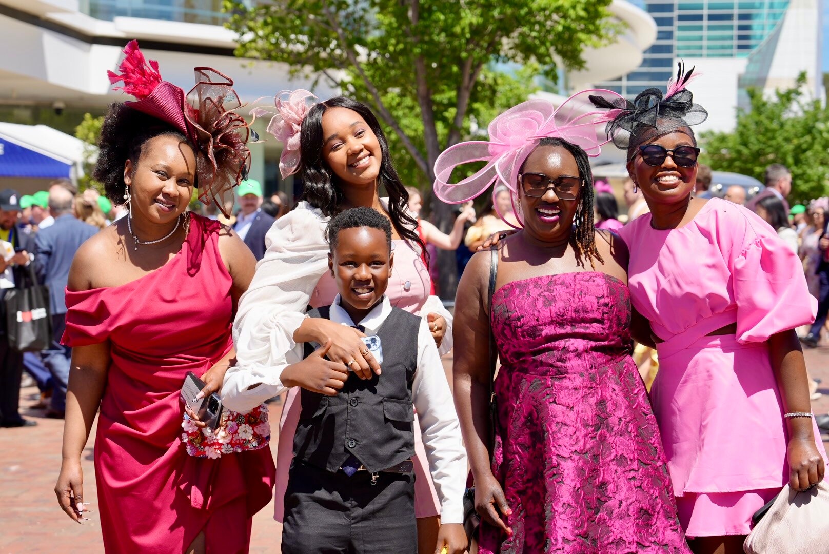 Melbourne Cup goers celebrate at Flemington Racecourse under warm and